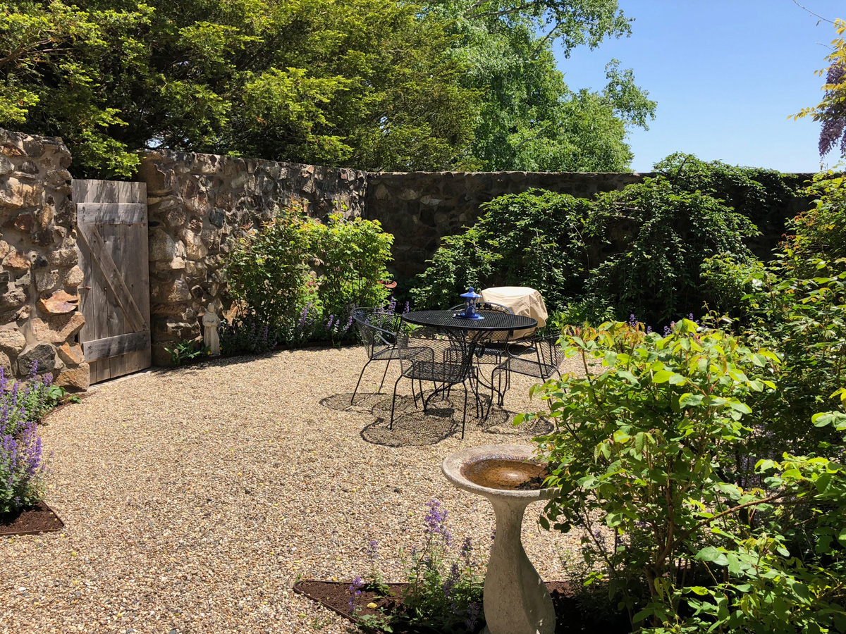 Private Garden with Stone Wall and Plants